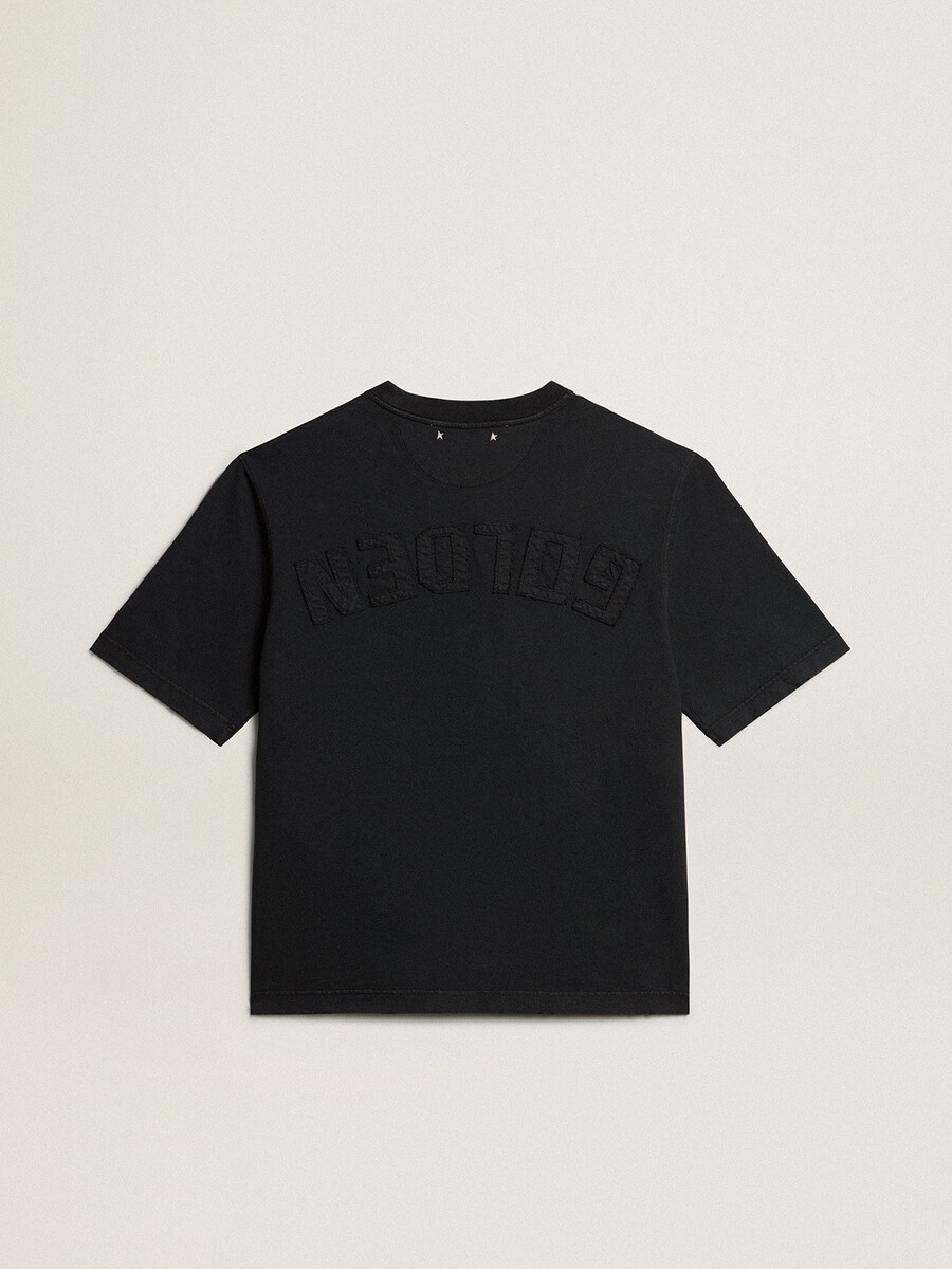 t-shirt i tvättad svart med omvänd logotyp på baksidan - jersey capsule