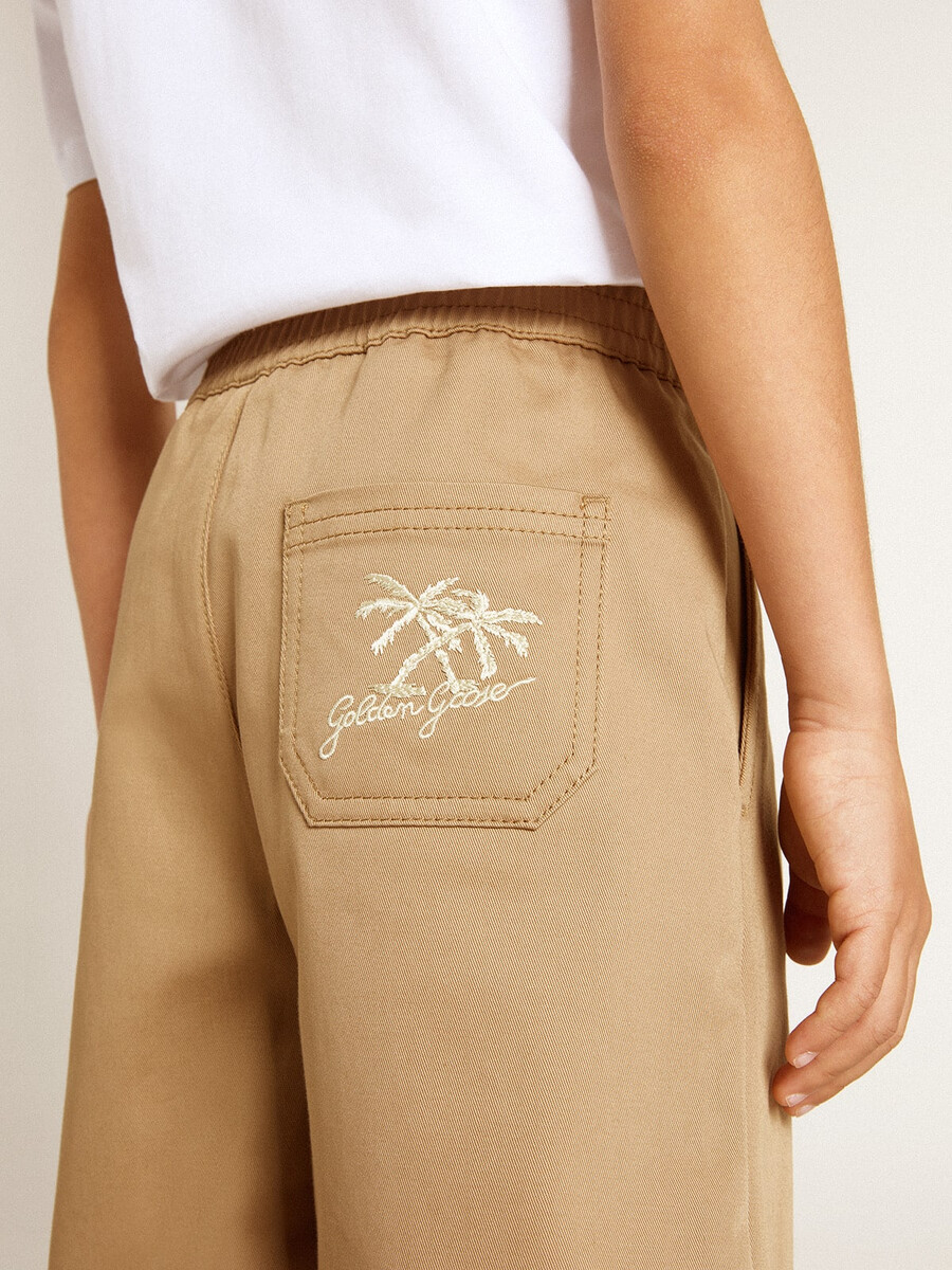 pojkshorts i beige bomull