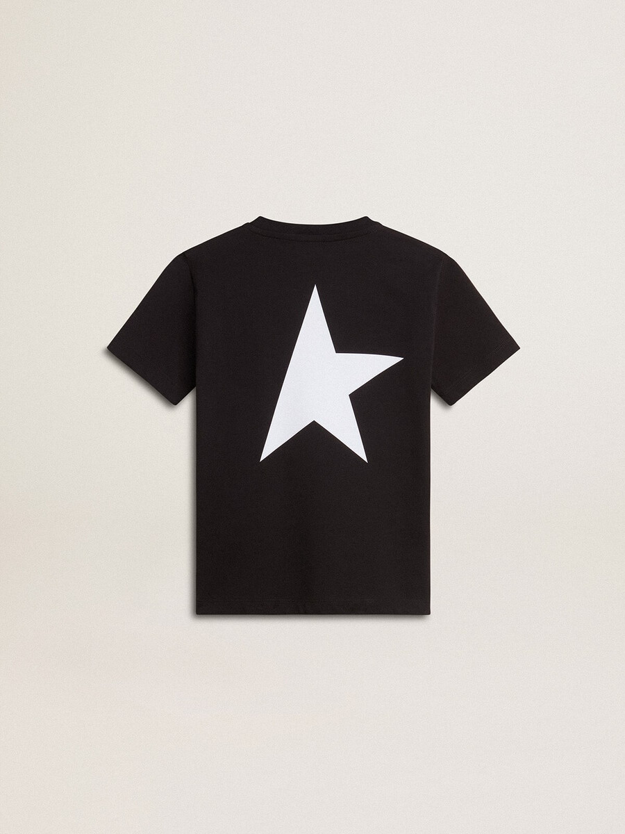 svart t-shirt med kontrasterande vit logotyp framtill och maxistjärna baktill