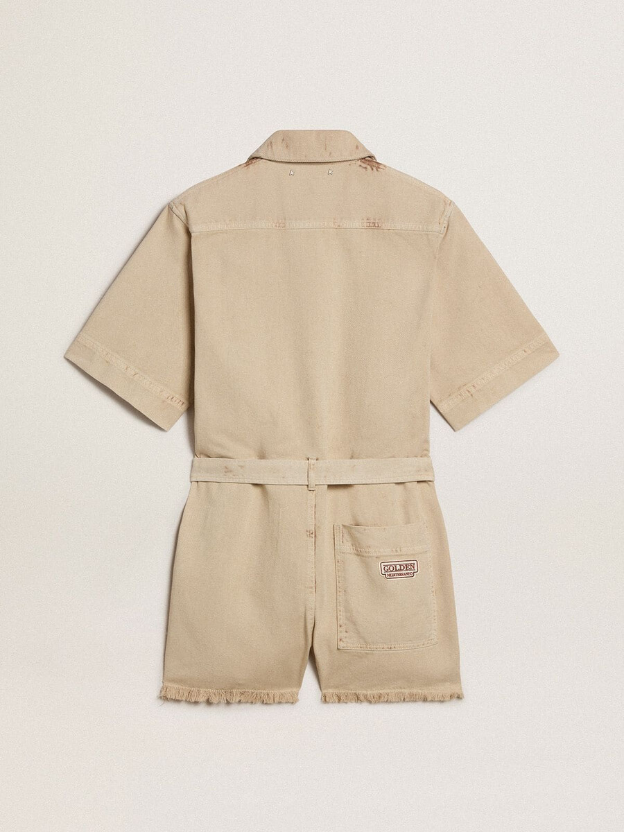damsparkbyxa i beige denim med skärp och fransad fåll