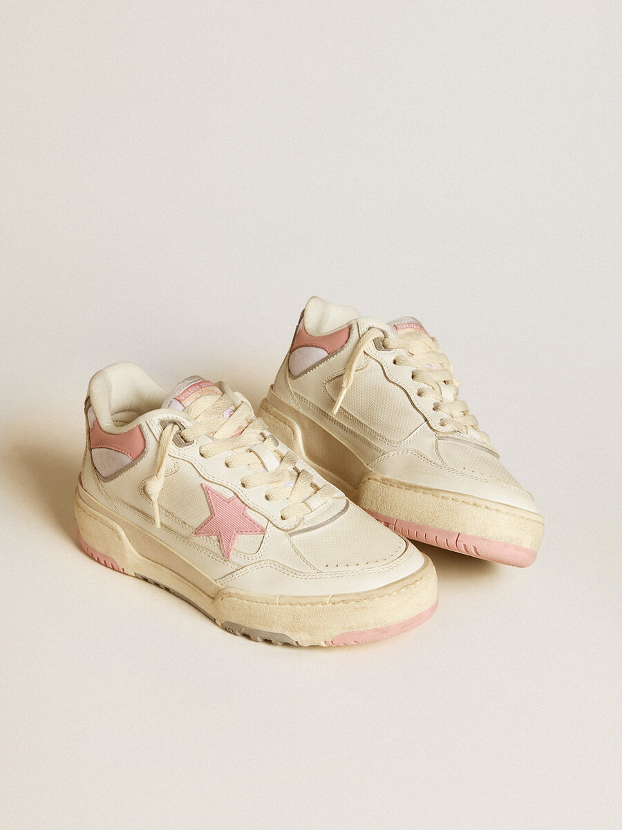 herr forty2 med rosa stjärna och vit läderhälflik
