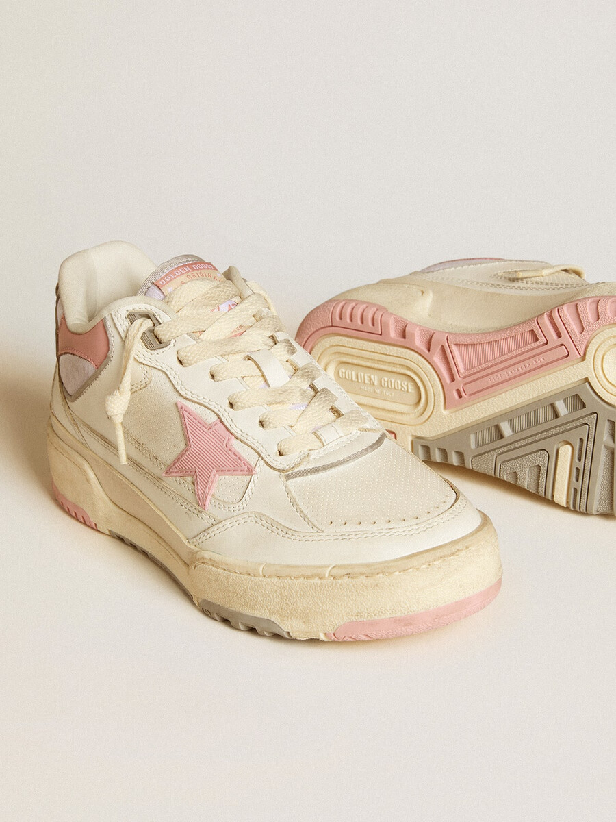 herr forty2 med rosa stjärna och vit läderhälflik