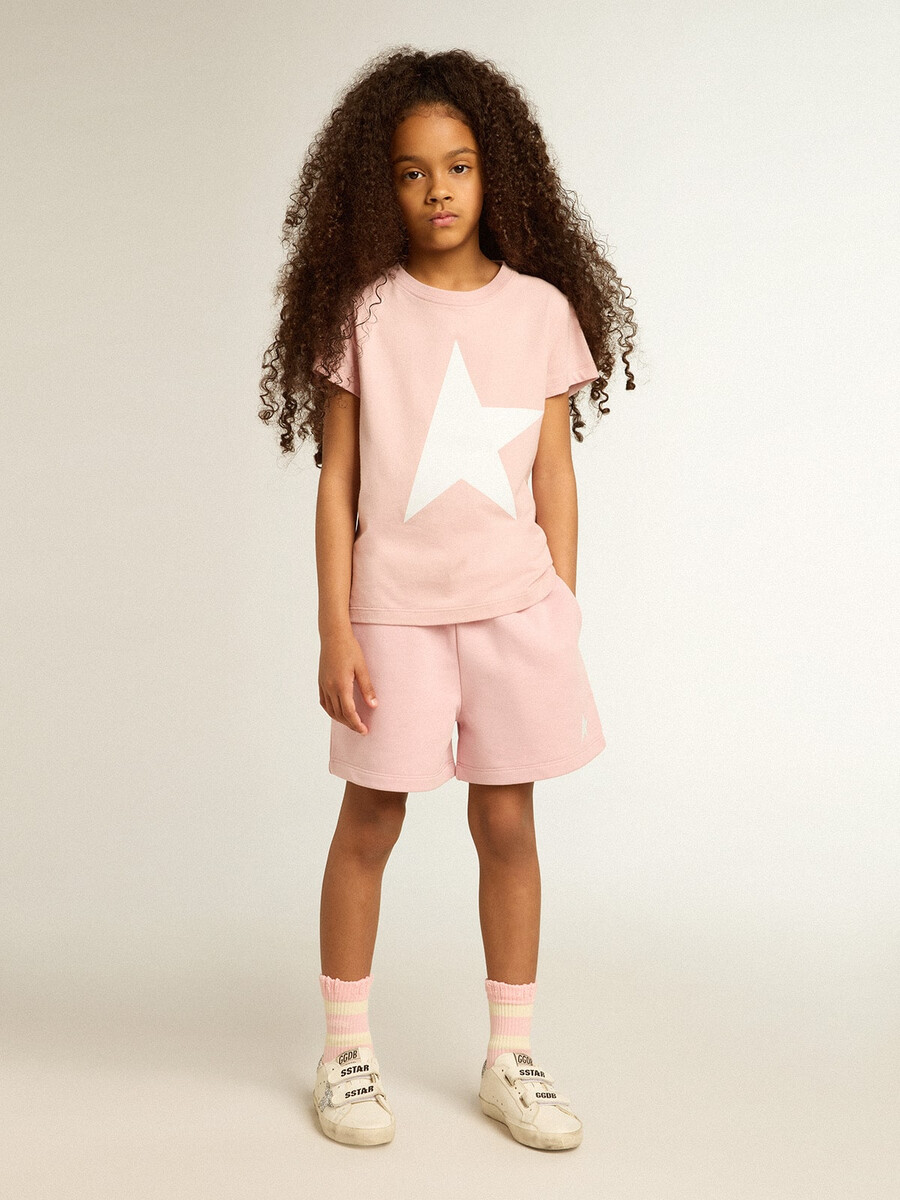 rosa t-shirt för flickor med vit logotyp och maxistjärna