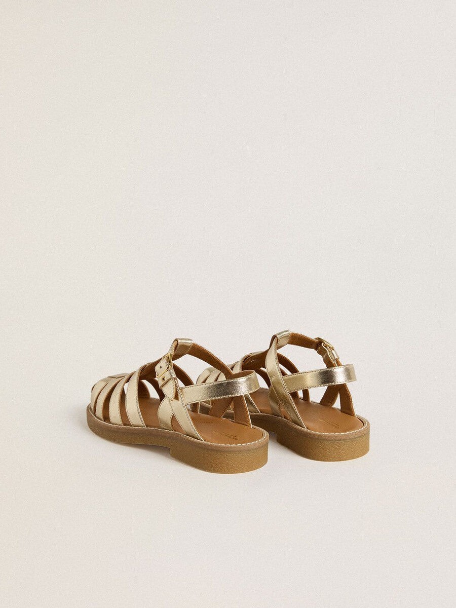 maxime young sandaler i guldfärgat läder