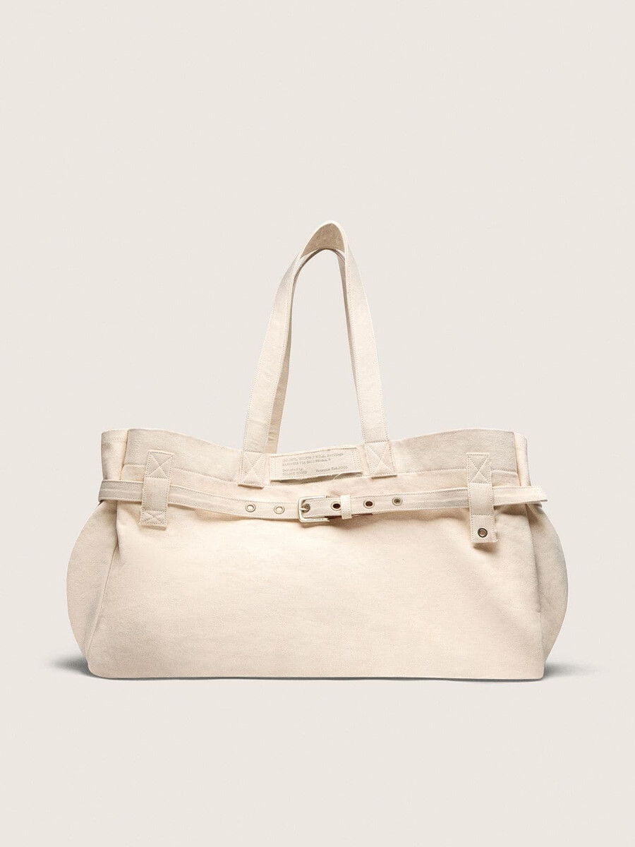 ecru canvas-väska med broderi och detaljer i antik silver