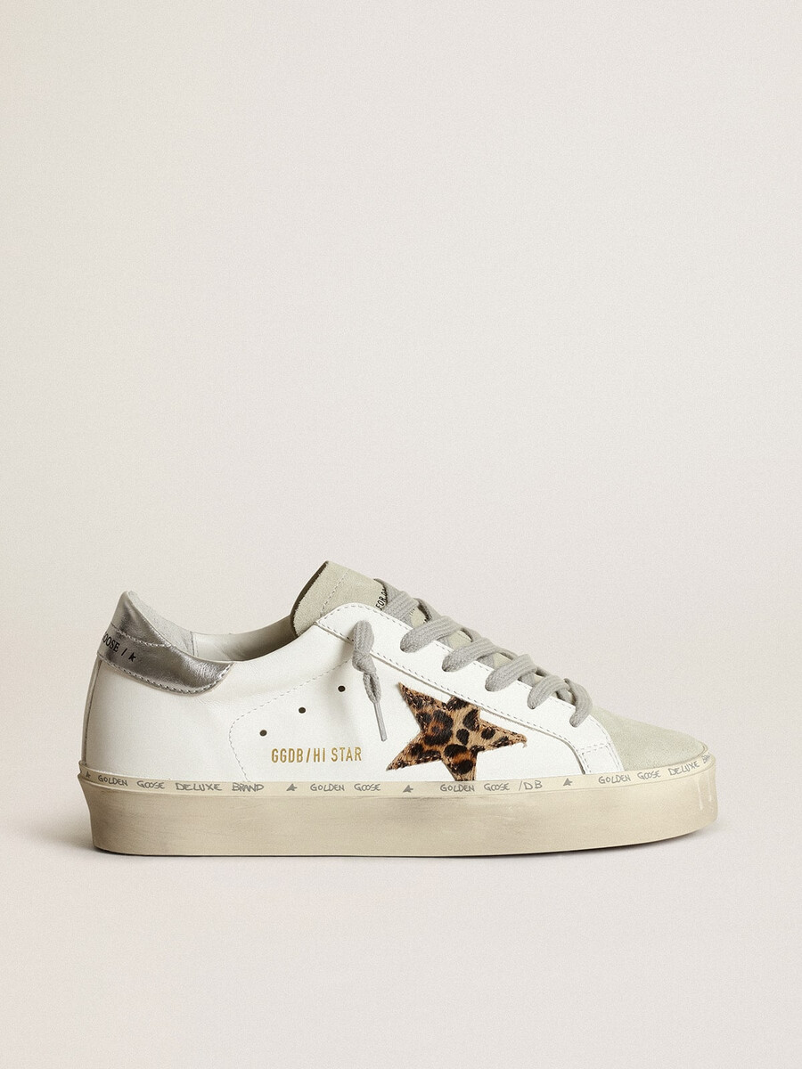 dam hi star med stjärna i leopardmönstrat ponnyskinn och silverfärgad klack