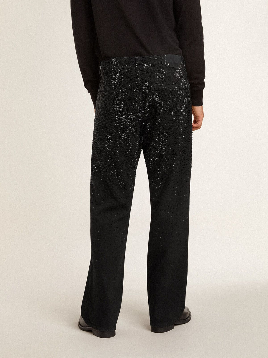 svarta herrjeans med lös passform och kristaller med gradienteffekt
