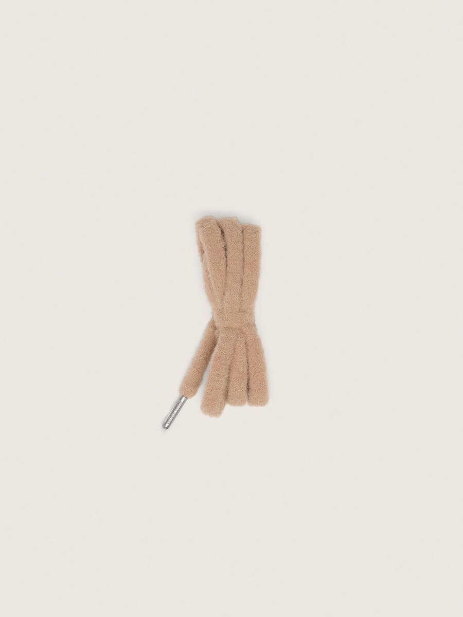beige puffiga snören