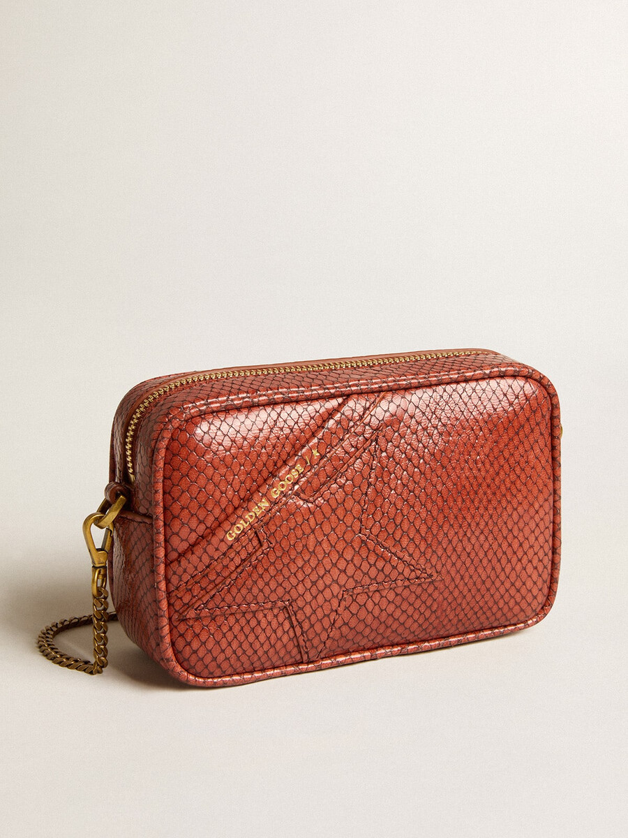 mini star-väska i rostfärgat ormskinnsmönstrat läder