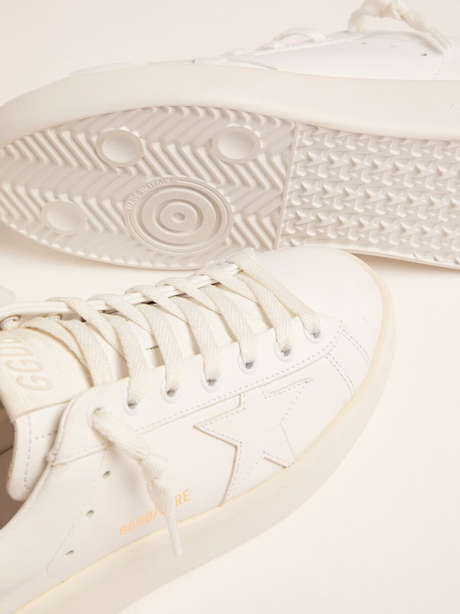 dam purestar sneakers med guldfärgad hälflik