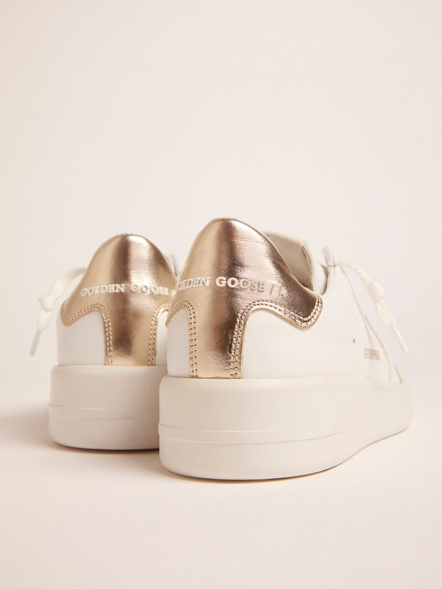 dam purestar sneakers med guldfärgad hälflik