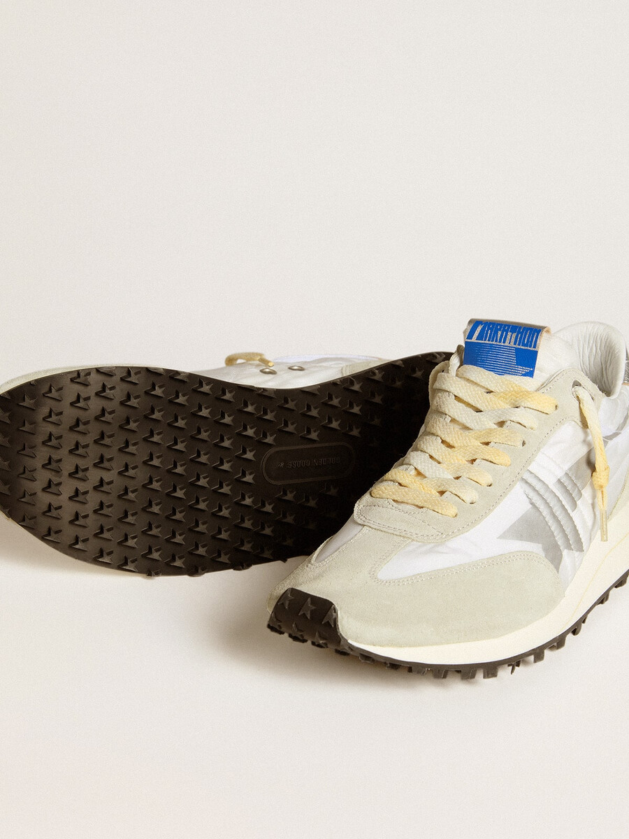 herrmarathon med vit nylonovandel och silverfärgad stjärna