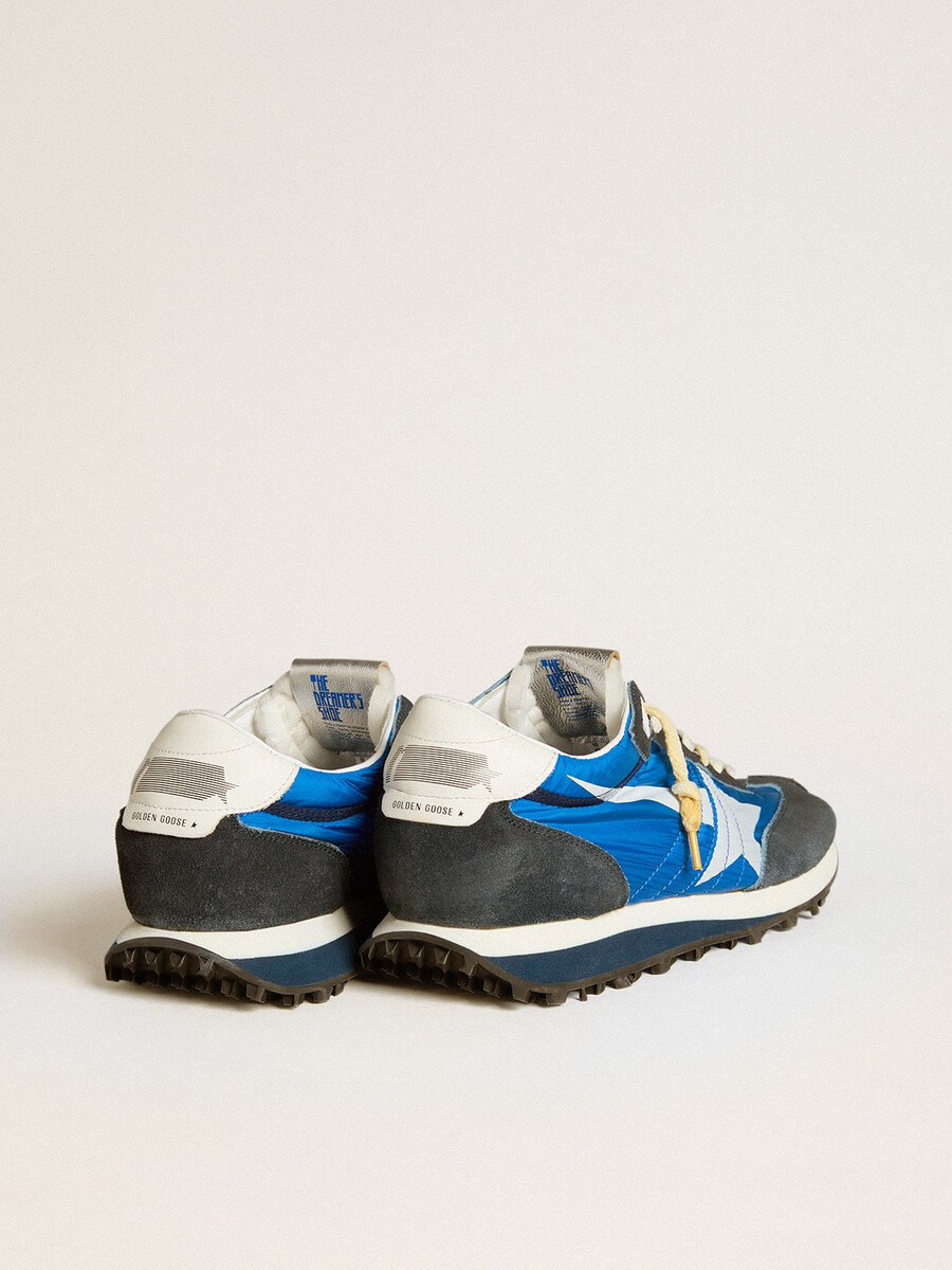 herrmarathon med blå nylonovandel och vit stjärna