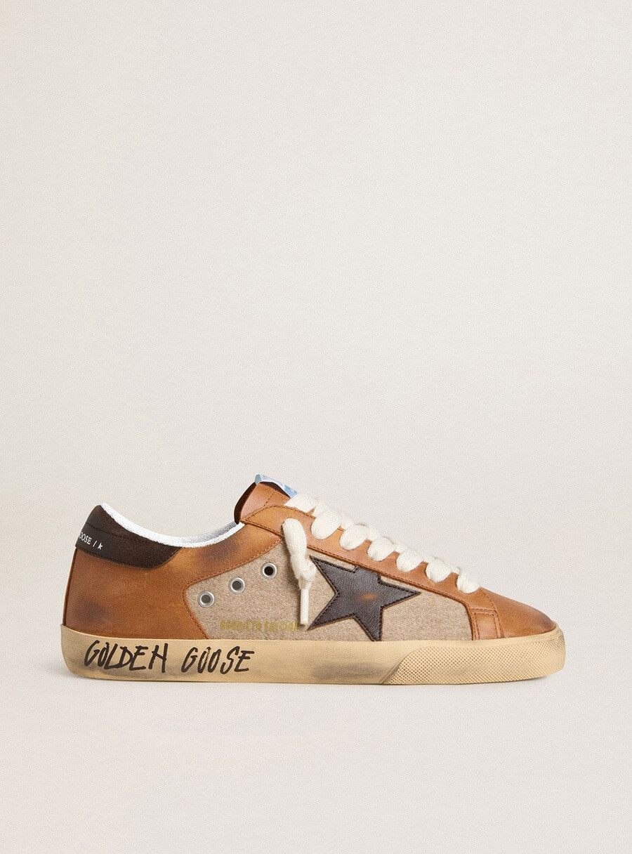herr super-star ltd i beige ull med brun läderstjärna och kamelfärgade inlägg
