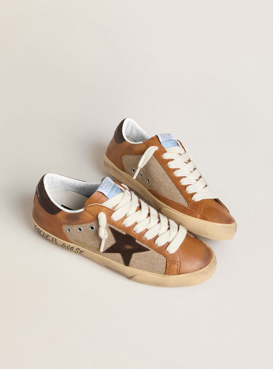 herr super-star ltd i beige ull med brun läderstjärna och kamelfärgade inlägg