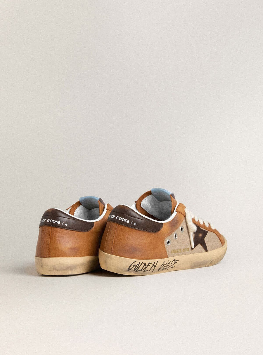 herr super-star ltd i beige ull med brun läderstjärna och kamelfärgade inlägg