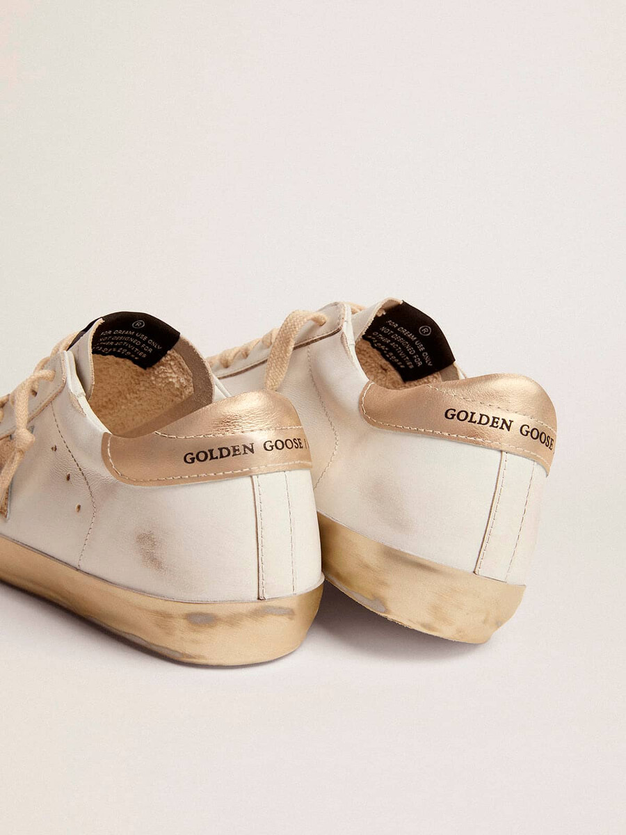 dam super-star sneakers med guldrävmönster