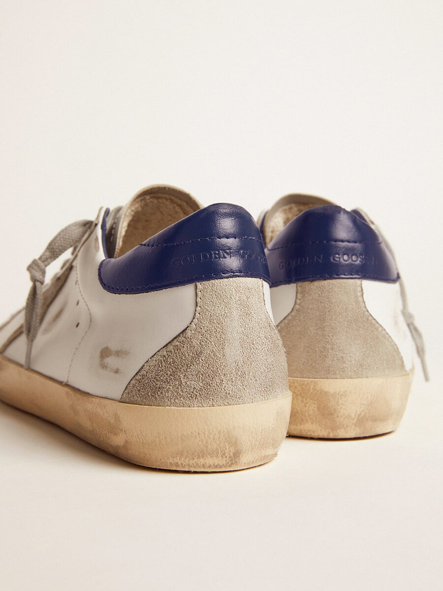 blå och vita super-star sneakers för kvinnor