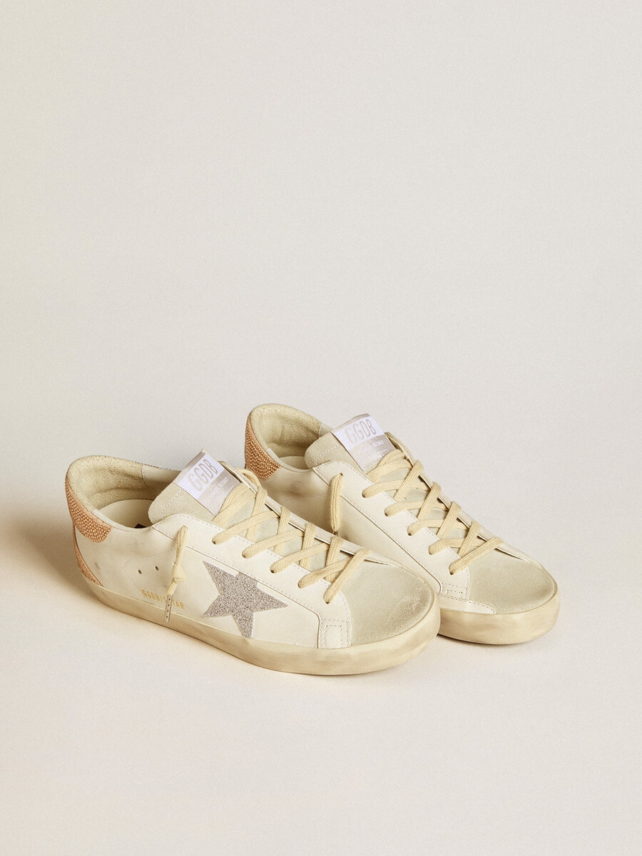 dam super-star i läder med swarovski-kristallstjärna och hälflik